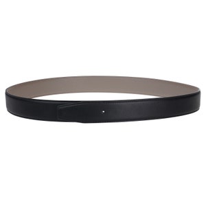 May include: A black leather belt with a brown leather lining. The belt is reversible and can be worn with either side facing out.