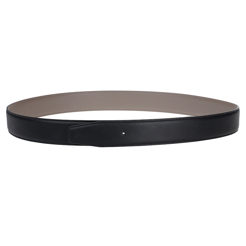 May include: A black leather belt with a brown leather lining. The belt is reversible and can be worn with either side facing out.