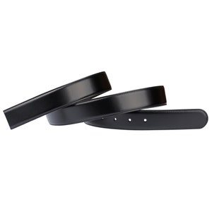 May include: A black leather belt with a buckle. The belt is folded in thirds and the buckle is not visible.