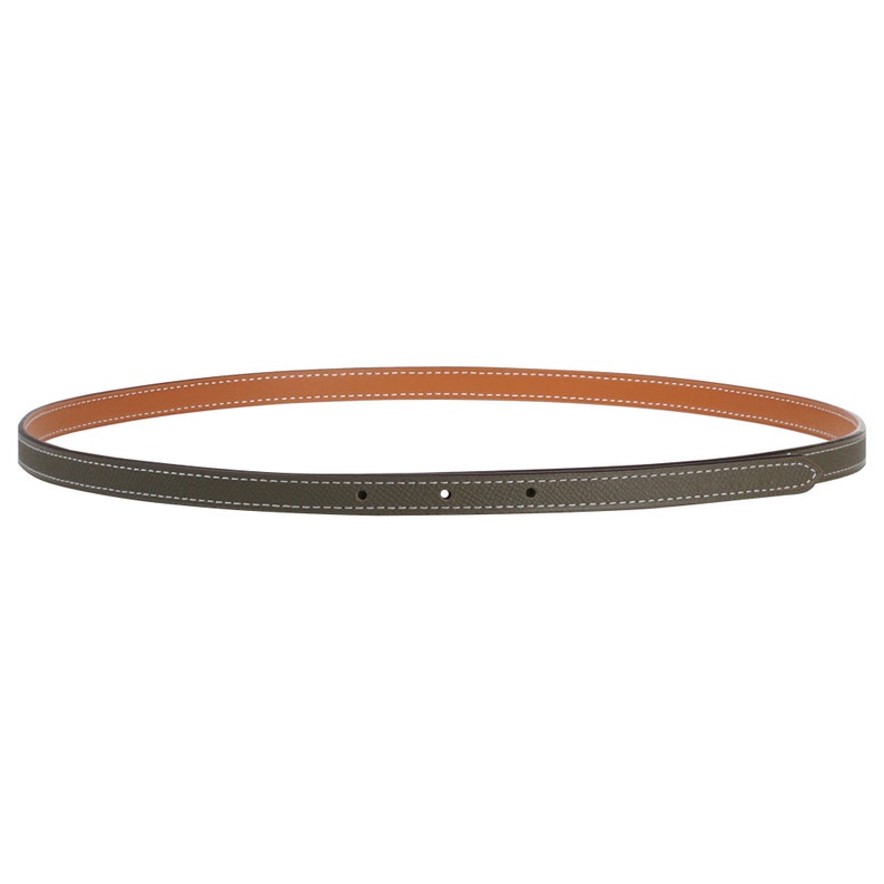 May include: A green leather belt with a brown leather lining and white stitching.