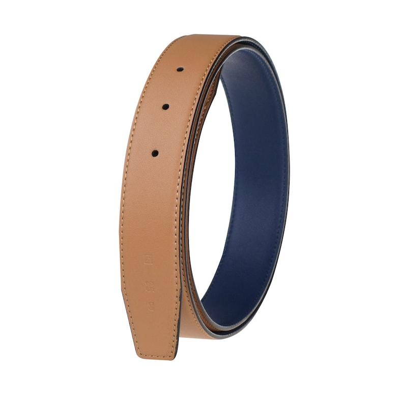 May include: A brown leather belt with a blue leather lining. The belt is rolled up and the end of the belt is visible.