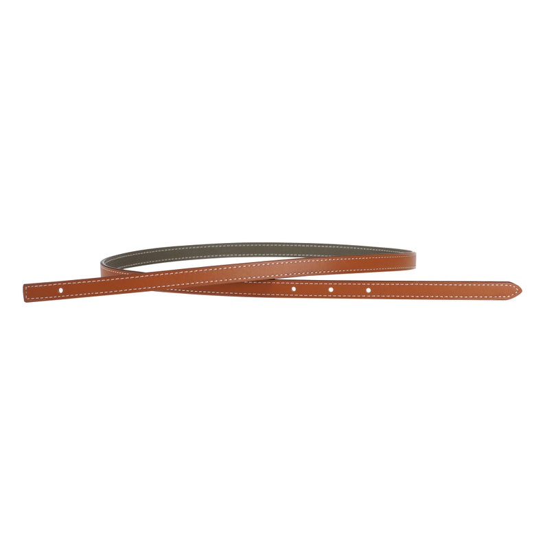 May include: A brown leather belt with white stitching and a green leather lining.