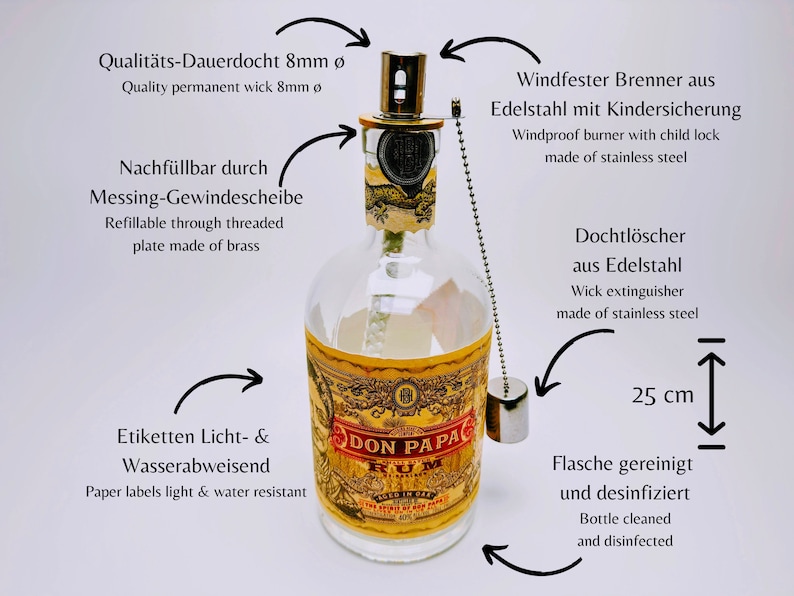 May include: A clear glass bottle with a gold label that reads "Don Papa Rum". The bottle has a metal cap with a childproof lock and a wick extinguisher. The bottle is 25 cm tall and is refillable through a threaded brass plate. The bottle is cleaned and disinfected.