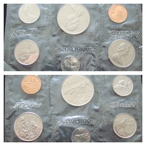 May include: A collection of Canadian coins in protective plastic sleeves. The coins vary in size and color, including silver and copper tones. The image showcases various denominations, featuring portraits and iconic Canadian symbols.