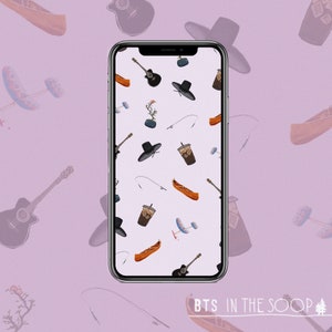May include: A smartphone displaying a wallpaper with a repeating pattern of various items, including a guitar, a fishing rod, a canoe, a cup of coffee, a potted plant, and a black hat. The text "BTS in the Soop" is displayed at the bottom of the screen.