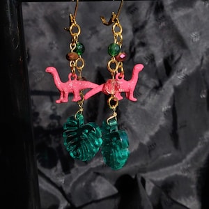 Pink dinosaur & monstera leaf earrings