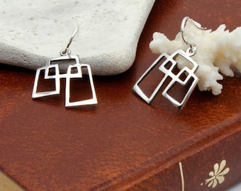 Contemporary style earrings in fine lines. In 925 Silver. Handmade