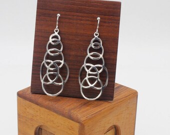 Large Crossed Circles earrings, handcrafted in solid 925 silver. 50mm long.
