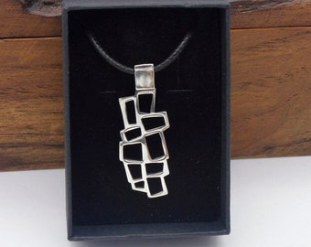 Pendant from the OKNA collection, Los sueños de Catalina, handmade author jewelry. Made in solid 925 sterling silver.