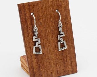 Small hook earrings in a modern style with curved shapes. Handmade 925 silver. Limited edition