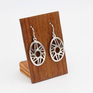 Ethnic oval earrings with openwork weave and fine polishing