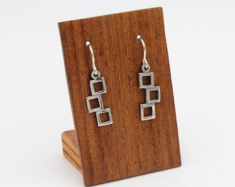 Earrings and light made up of small squares joined. Sterling silver. Handcrafted