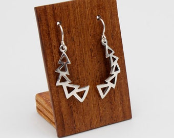 Original earrings with triangular shapes in ethnic style. With triangles. Handcrafted. In Sterling Silver 925.