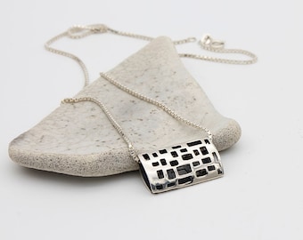 Handmade two-sided pendant made of silver from the ZEILEN collection