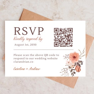 May include: RSVP card with a floral design and a QR code. The text reads "RSVP Kindly respond by August 1st, 2030. Please scan the above QR code to respond to our wedding website clarandrian.co Caroline + Andrew"