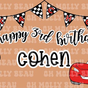 May include: A rectangular banner with a tan background featuring a black and white checkered bunting at the top with red letters spelling KACHOW. The text reads happy 3rd birthday COHEN. A brown tow truck and a red race car are on the sides.