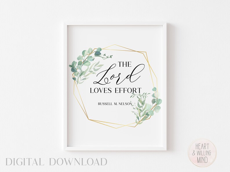 Może przedstawiać: Drukowana grafika ścienna z geometryczną złotą ramą i zielonymi liśćmi eukaliptusa. Cytat w ramie brzmi "Pan kocha wysiłek - Russell M. Nelson".