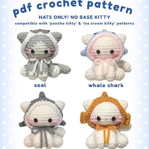 May include: A PDF crochet pattern featuring four small stuffed cat figures wearing different hats: a gray seal, a light blue whale shark, a dark gray shark, and an orange clownfish. The text reads: pdf crochet pattern, HATS ONLY! NO BASE KITTY, compatible with 'poncho kitty' & 'ice cream kitty' patterns.