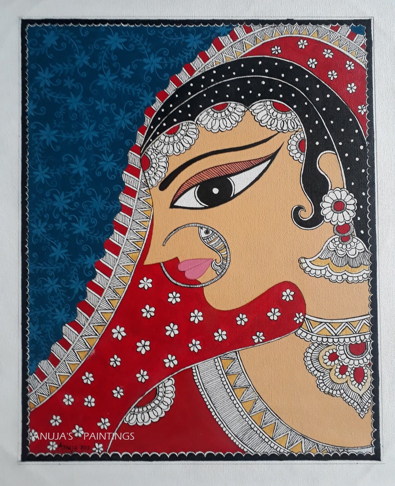 May include: A vibrant painting of a woman's profile, adorned in traditional Indian attire. The artwork features a red veil with white floral accents, a black head covering, and intricate jewelry. The background is a deep blue with a floral pattern. The artist's signature is in the bottom left corner.