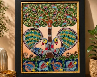 May include: A framed painting featuring two large peacocks with green and yellow plumage standing at the base of a tree filled with small birds. Below the peacocks, four colorful fish swim in a dark blue water section. The frame is black.