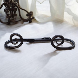 A Pair of Blacksmith made Wrought Iron Hand Forged Medieval Curtain Hooks.