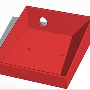 May include: A red plastic box with a round hole in the top and two small holes on the bottom.