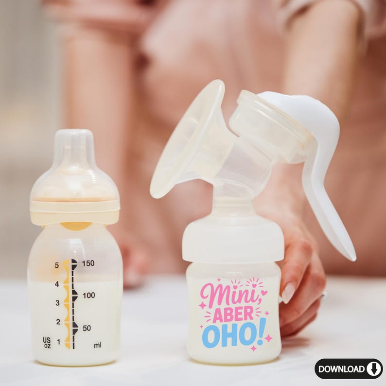 May include: A breast pump and baby bottle are displayed. The bottle has measurements in ounces and milliliters. The breast pump has the text "Mini, Aber, OHO!" in pink and blue.