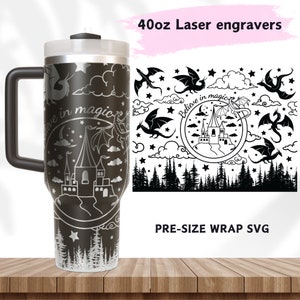 May include: A black 40oz tumbler with a laser engraved design featuring a castle, dragons, stars, clouds, and the text "Believe in magic". The design is in a silver color. The tumbler is on a wooden surface. The image also shows a pre-sized wrap SVG file for laser engraving.