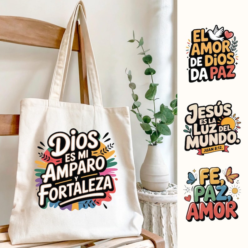 May include: A cream-colored tote bag with the words "Dios es mi Amparo y Fortaleza" in a colorful design. The image also shows three other designs with text: "El amor de Dios da paz", "Jes&uacute;s es la luz del mundo", and "Fe, Paz, Amor".