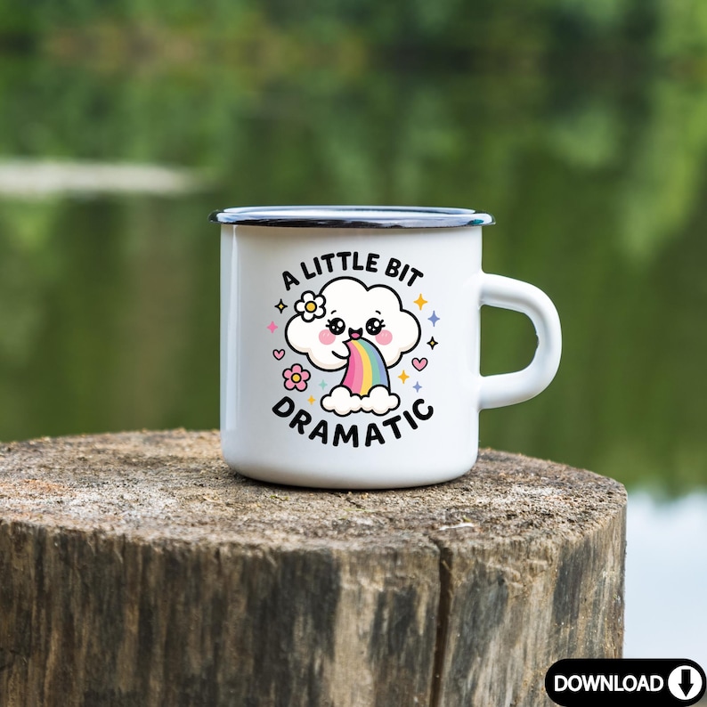 May include: White enamel mug with a black rim and handle. The mug features a cartoon cloud with a rainbow coming out of its mouth. The text "A little bit dramatic" is printed on the mug.