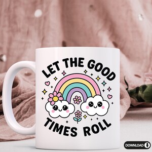 May include: White ceramic mug with a rainbow, clouds with faces, and the text "Let the good times roll".