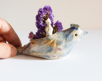 Bird pot with child inside ceramic. Small bird figure for mini pot, vase.