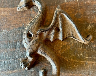 Gancio da muro drago in ghisa