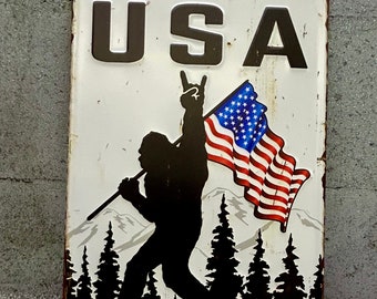 Bigfoot and the American Flag Embossed sign