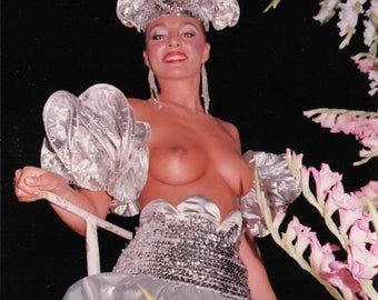 Vintage photo 1980s - beautiful semi-nude woman in carnival outfit