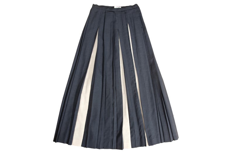 May include: A set of three ceramic mugs with a speckled, matte finish. The mugs are in shades of cream, light gray, and dark gray. Each mug has a simple, minimalist design, perfect for coffee or tea.