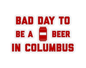 May include: Red sticker with the text "Bad day to be a beer in Columbus" with a red can icon in the middle.