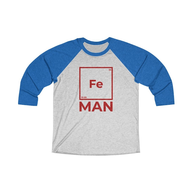 May include: A gray and blue baseball tee shirt with a red square graphic featuring the chemical symbol for iron, Fe, and the word "MAN" below it.