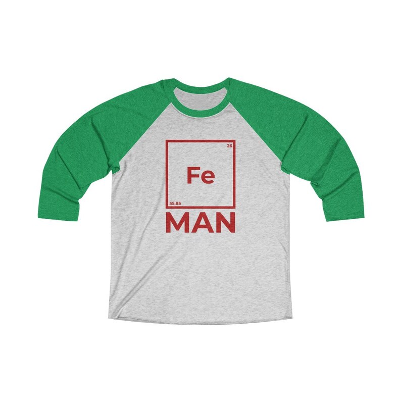 May include: A gray and green baseball tee shirt with a red square graphic featuring the chemical symbol for iron, Fe, and the word "MAN" below it.