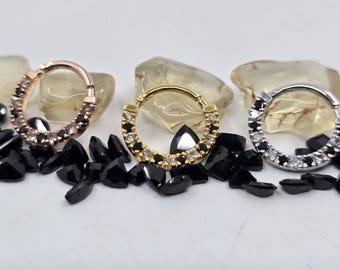 Sophisticated Oregon Sunstone and black spinel septum/daith ring in 14k yellow,  white or rose gold.  Elegant, cute,  glamorous, unisex