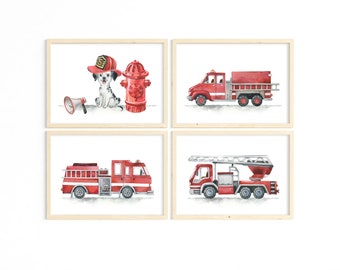 May include: Set of four framed prints featuring watercolor illustrations of fire trucks and a dalmatian dog wearing a firefighter's hat. The prints are in a white frame with a light wood finish.