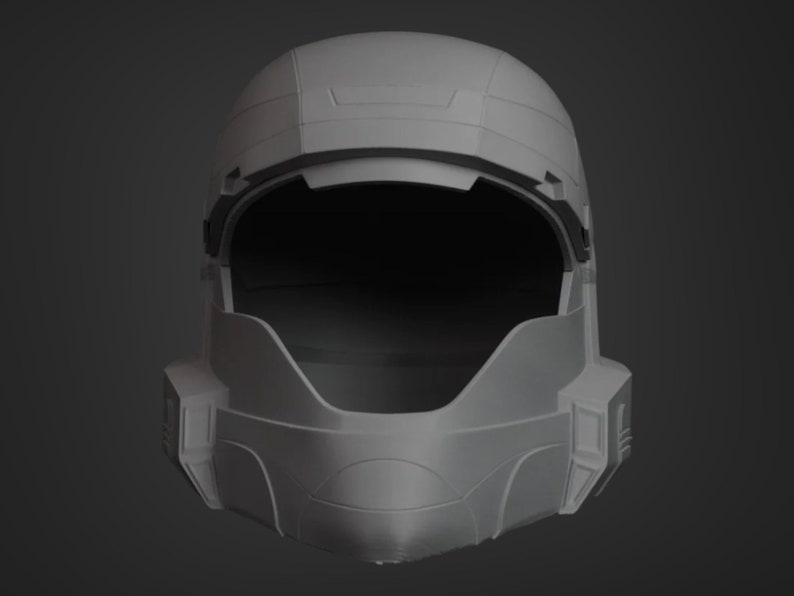 Puede incluir: Un casco de pl&aacute;stico blanco con una visera y un interior gris oscuro. El casco tiene una superficie texturizada y un dise&ntilde;o que se asemeja a un casco de soldado futurista.