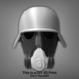 May include: A DIY 3D printed mask in black, white, and gray. The mask features a helmet-like top, eye openings, and a respirator section. The text "This is a DIY 3D Print (Do It Yourself)" is at the bottom.