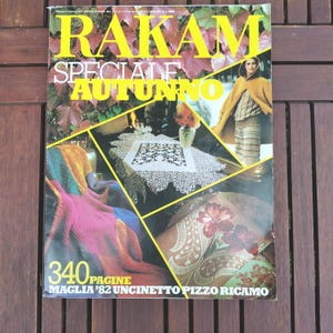 May include: A vintage magazine cover with the title "RAKAM SPECIALE AUTUNNO" in yellow letters. The cover features a collage of images, including a woman in a hooded cape, knitted items, and lace. The magazine has 340 pages.
