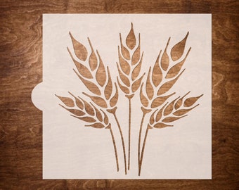 May include: A stencil of wheat stalks, a popular design for home decor and crafts.