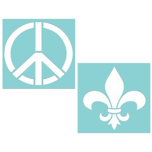 May include: Two stencils, one with a peace sign and the other with a fleur-de-lis design. Both stencils are white on a light blue background.