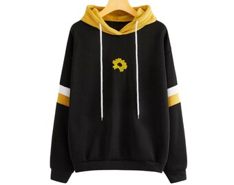 yellow hoodie with sunflowers on sleeves