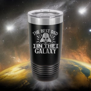 May include: Black stainless steel tumbler with a white design that says "The Best Dad In The Galaxy" with a Darth Vader graphic.