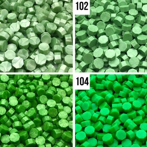 May include: Four close-up images of green wax seal beads. The beads are arranged in a random pattern. The images are labeled 101, 102, 103, and 104.