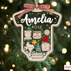 May include: A baby onesie-shaped wooden ornament featuring the name Amelia Rose, a clock showing 12:25 am, a calendar date of January 20, 2025, a Texas map, a Christmas tree, a heart, and a scale reading 6 lbs 8 oz, with 19.5 inches text.
